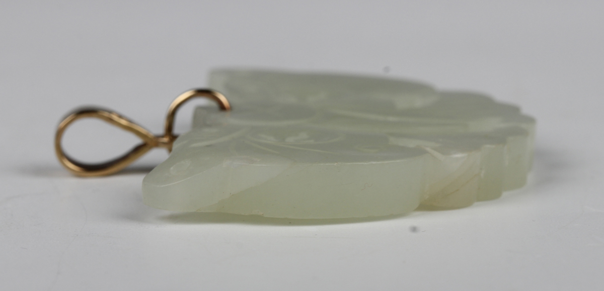 A Chinese pale celadon jade pendant, probably 20th century, carved and pierced in the form of a - Image 6 of 8