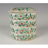A Chinese famille rose porcelain stacking four-tier food box and cover, early 20th century, of