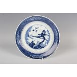 A Chinese blue and white porcelain circular dish, Kangxi period, the centre painted with a dragon