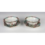 A pair of Chinese famille rose porcelain octagonal bowls and stands, 19th century, each facet