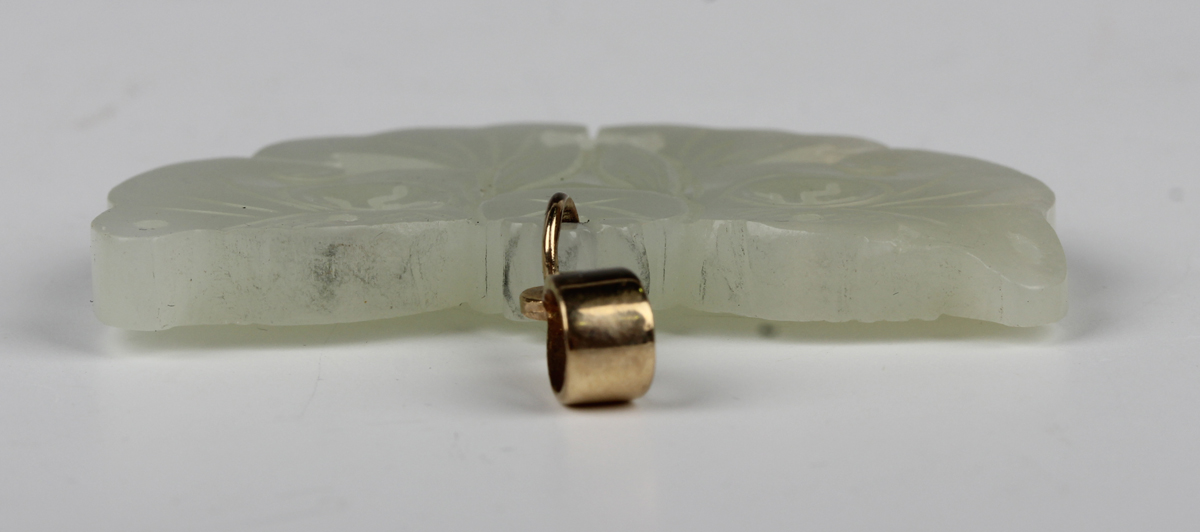 A Chinese pale celadon jade pendant, probably 20th century, carved and pierced in the form of a - Image 5 of 8
