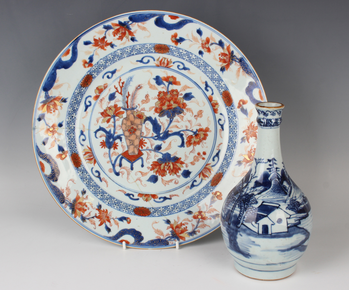 A Chinese blue and white porcelain guglet, late 18th century, painted with pavilions and trees in