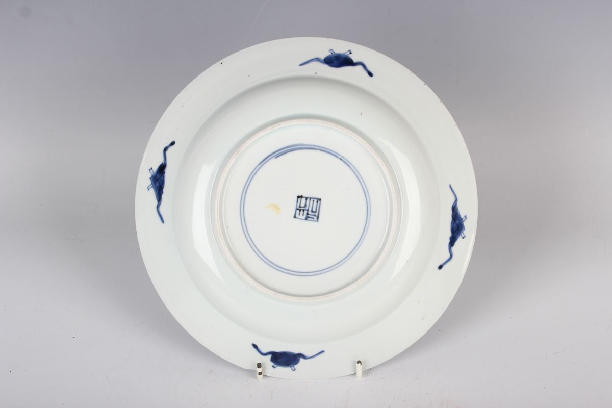 A Chinese blue and white porcelain circular dish, Kangxi period, the centre painted with a dragon - Image 3 of 4