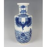 A Chinese blue and white porcelain rouleau vase, probably 20th century, the body painted to one side