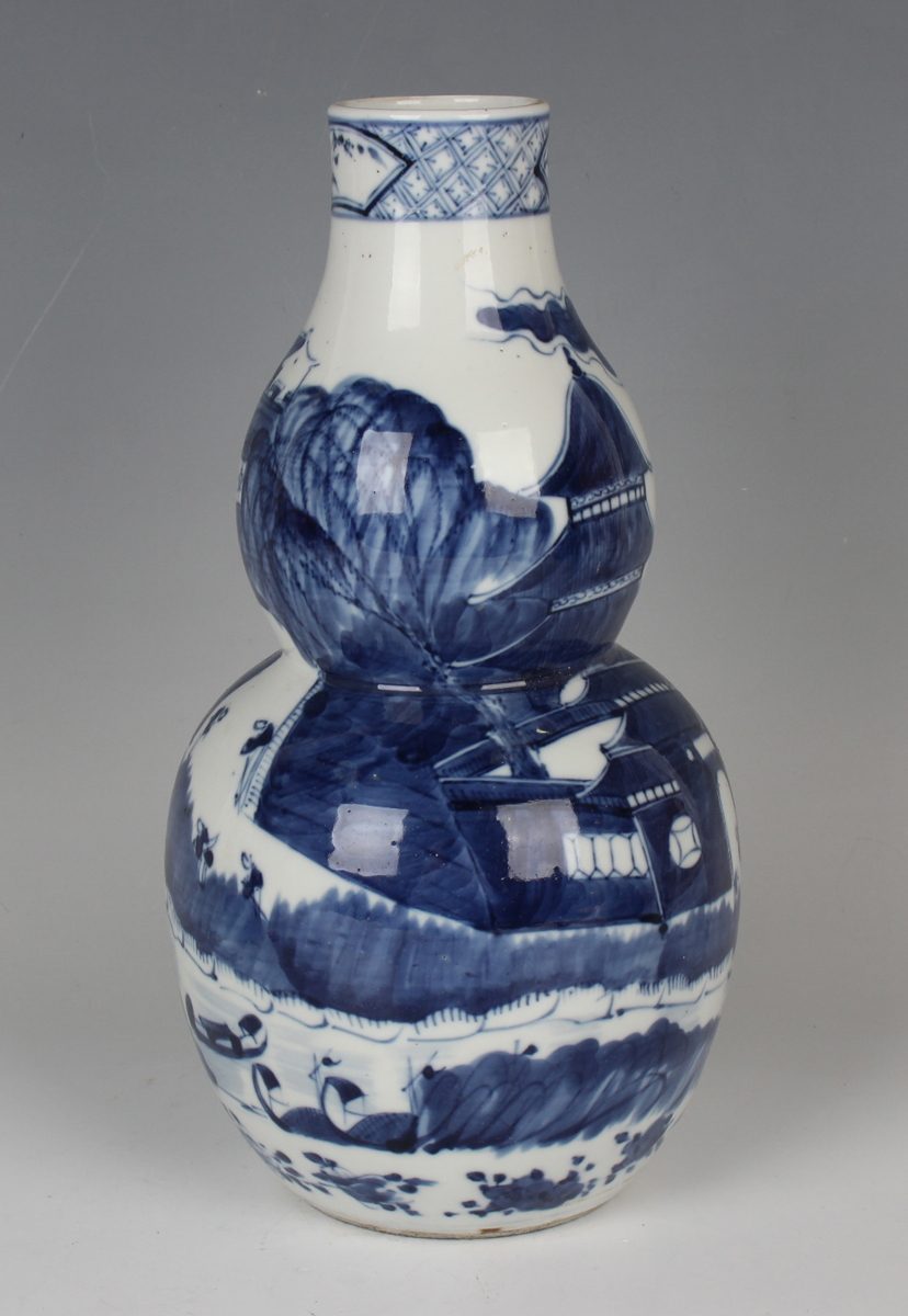 A Chinese blue and white porcelain double gourd shaped vase, mark of Kangxi but late 19th century, - Image 7 of 10