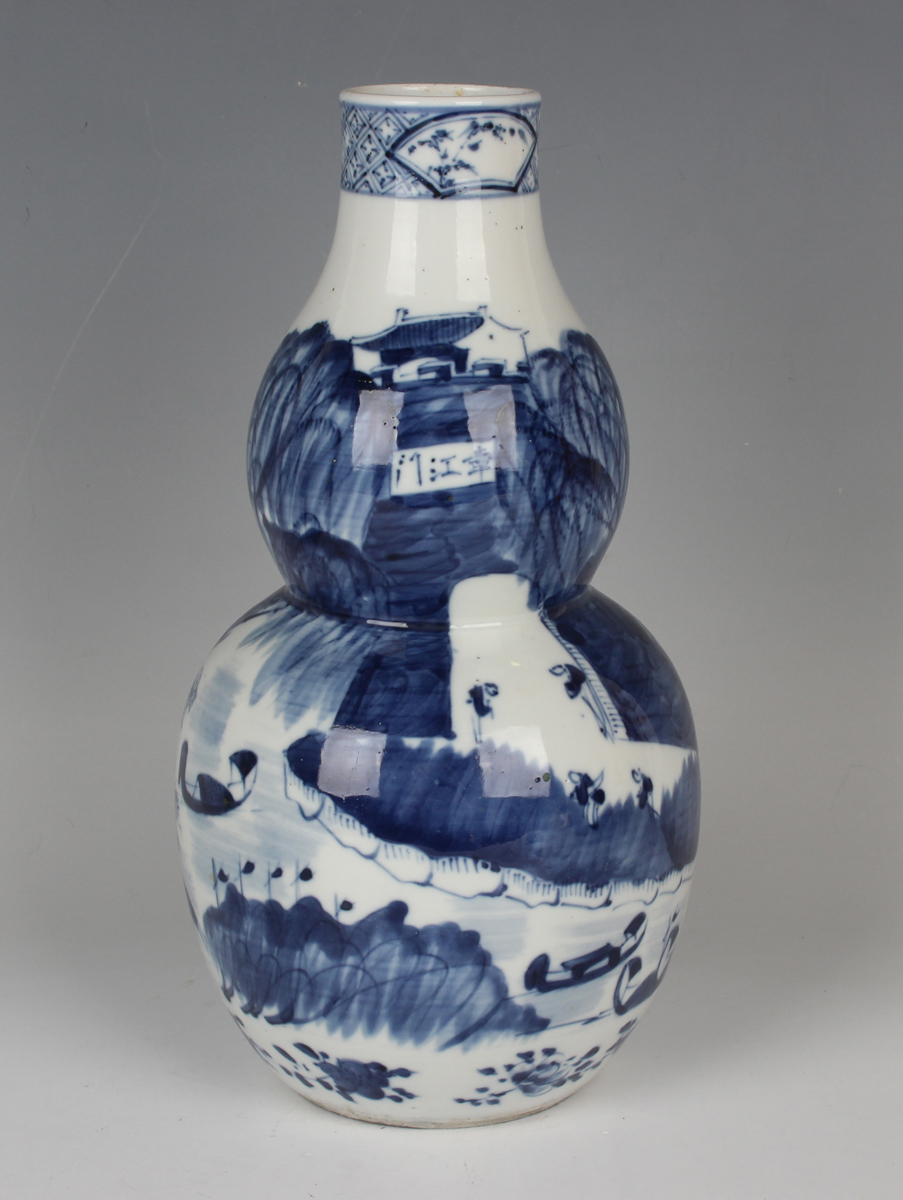 A Chinese blue and white porcelain double gourd shaped vase, mark of Kangxi but late 19th century, - Image 8 of 10