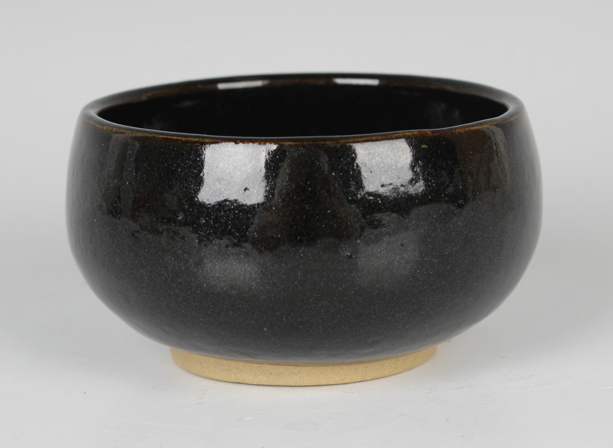 A Chinese dark brown glazed stoneware bowl, Song dynasty style but later, the interior with 'oil- - Image 4 of 4