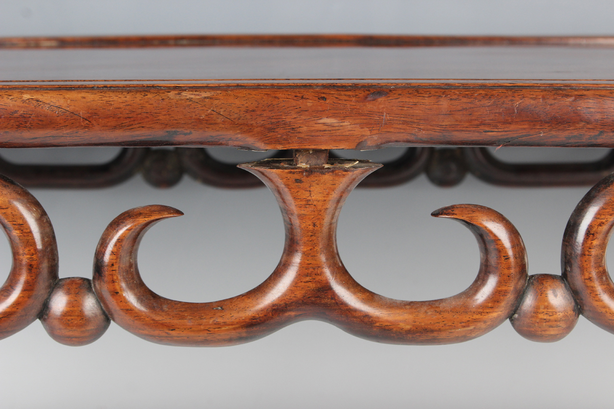 A Chinese hardwood low table, early 20th century, the rectangular panelled top above a carved and - Image 9 of 18