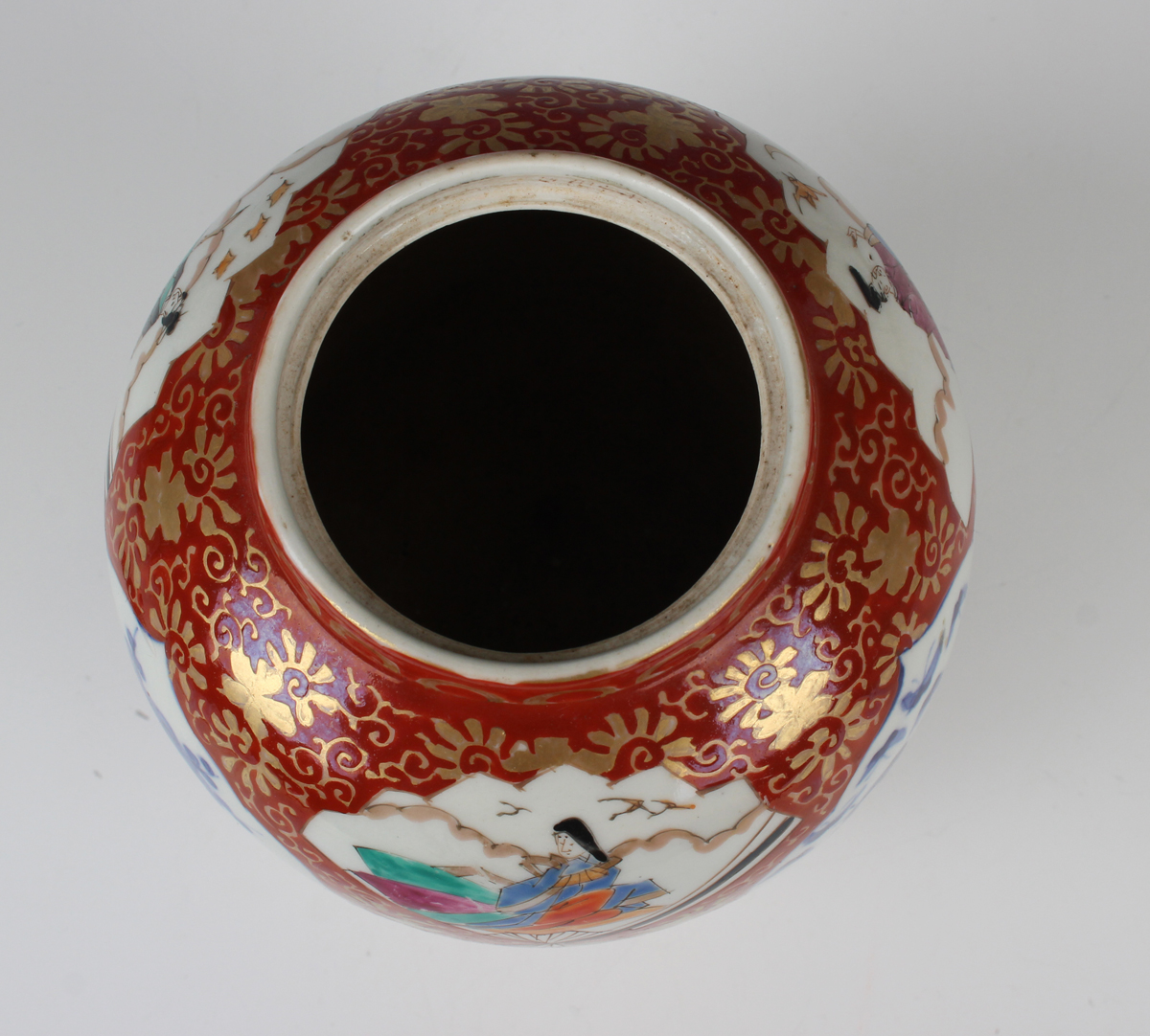 A Japanese Imari porcelain jar and cover, Meiji period, of ovoid form, painted with various panels - Image 12 of 22