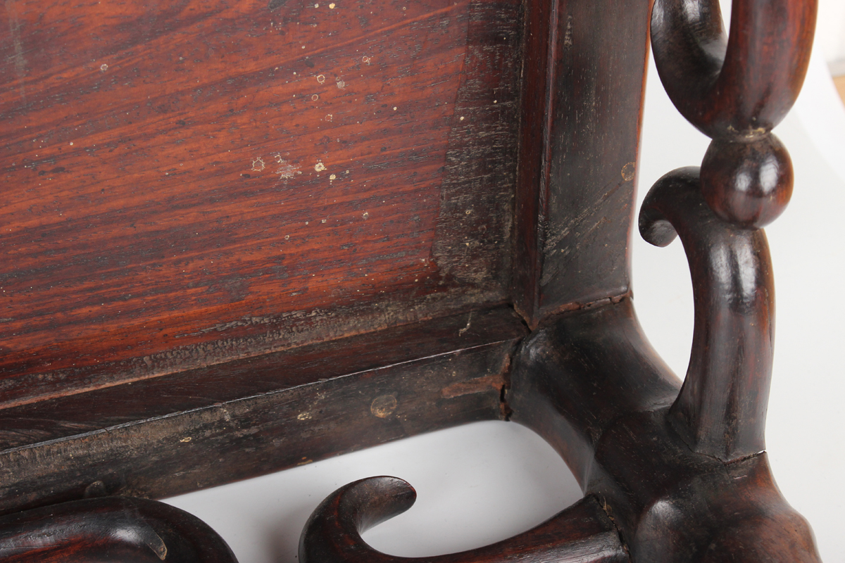 A Chinese hardwood low table, early 20th century, the rectangular panelled top above a carved and - Image 3 of 18