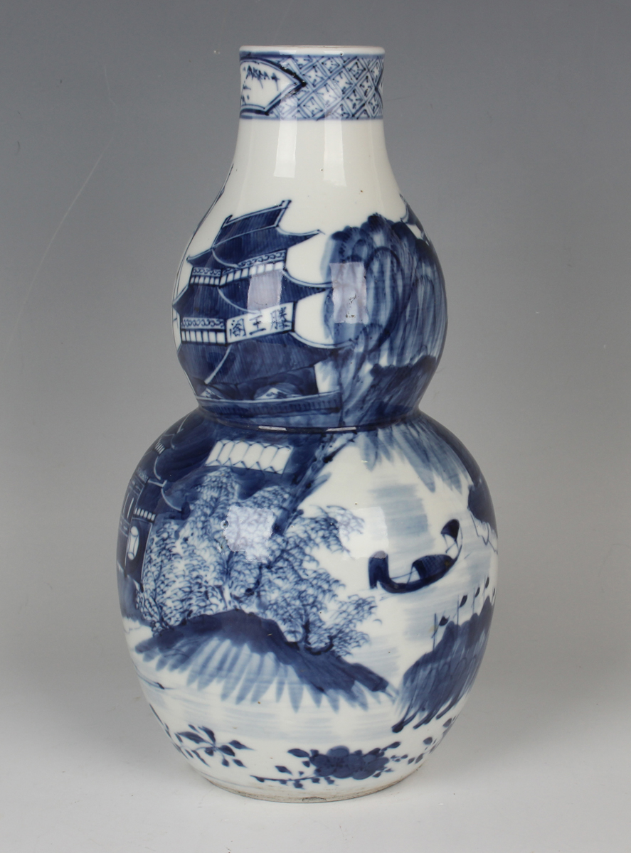 A Chinese blue and white porcelain double gourd shaped vase, mark of Kangxi but late 19th century, - Image 9 of 10