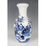 A Chinese blue and white porcelain vase, mark of Kangxi but late 19th century, the shouldered