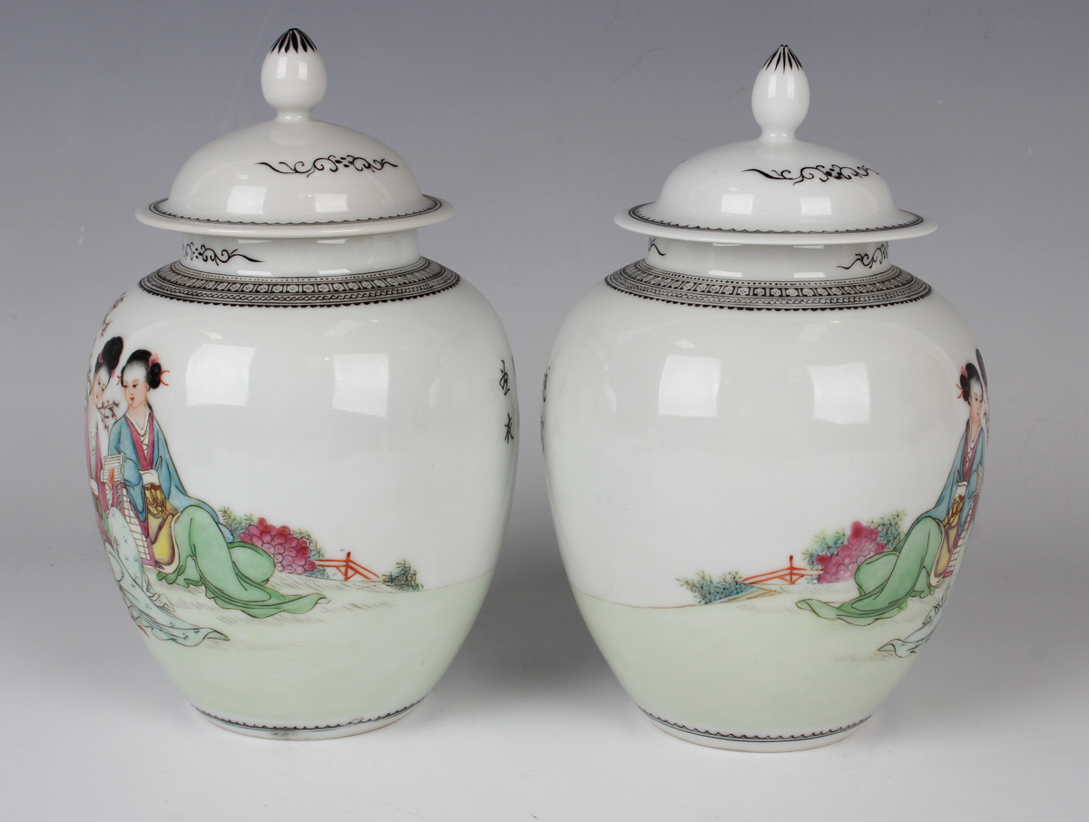 A pair of Chinese famille rose porcelain jars and covers, 20th century, each ovoid body painted with - Image 12 of 14