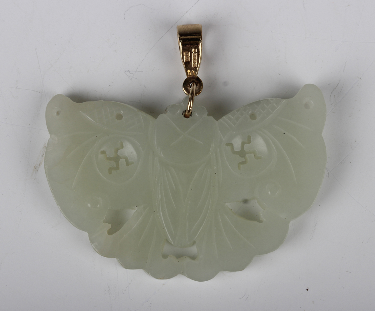 A Chinese pale celadon jade pendant, probably 20th century, carved and pierced in the form of a - Image 8 of 8