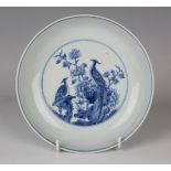 A Chinese blue and white celadon-backed porcelain saucer dish, mark of Kangxi but probably 20th