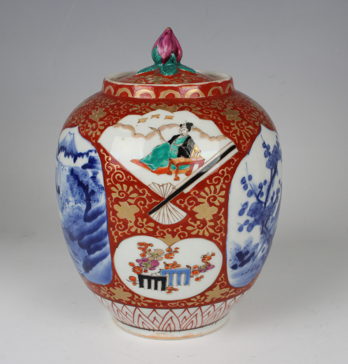 A Japanese Imari porcelain jar and cover, Meiji period, of ovoid form, painted with various panels - Image 19 of 22