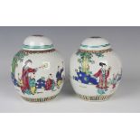 A pair of Chinese famille rose porcelain ginger jars and covers, 20th century, each painted with