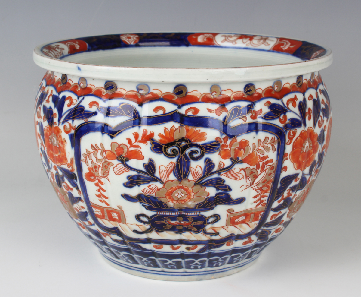 A Japanese Imari porcelain jardinière, Meiji period, of lobed circular form, painted and gilt with