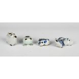 A group of four Chinese porcelain zoomorphic water droppers, Qing dynasty, including a blue and