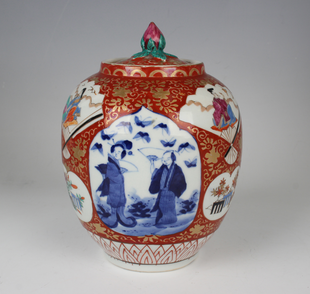A Japanese Imari porcelain jar and cover, Meiji period, of ovoid form, painted with various panels - Image 22 of 22