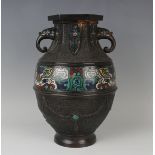 A Japanese brown patinated bronze and champlevé enamel vase, Meiji period, of Chinese archaistic