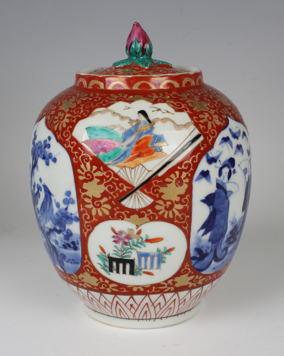 A Japanese Imari porcelain jar and cover, Meiji period, of ovoid form, painted with various panels - Image 17 of 22