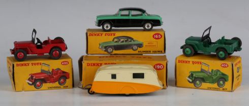 Four Dinky Toys vehicles, comprising No. 165 Humber Hawk, green and black, No. 190 caravan, cream
