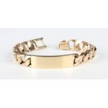A 9ct gold faceted curblink identify bracelet with a curved panel to the front, with a foldover