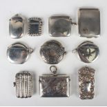 An Edwardian silver vesta case in the form of a four-section cigar case with engraved decoration,