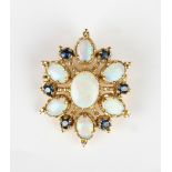 A 9ct gold, opal and sapphire pendant brooch, mounted with the principal oval opal within a surround