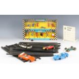 A collection of Scalextric, including a race-tuned Mercedes, a C9 Ferrari GP, a C8 Lotus