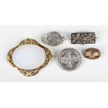 A group of mostly Victorian brooches, comprising an oval gold brooch with a central buckle and strap