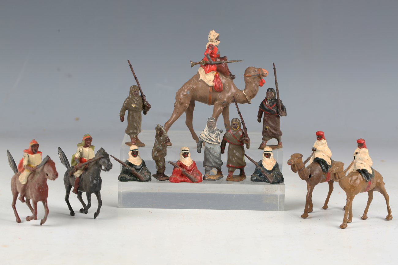 A small collection of Britains lead figures of Arabs, comprising five riding horses, three riding