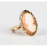 A 9ct gold and oval shell cameo ring, carved as a portrait of a lady, London 1966, weight 3.9g, ring