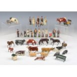 A collection of Britains, John Hill & Co and other lead farm items, including carts, cows, bulls,