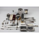 A small collection of silver and silver mounted items, including a George V cigarette case,