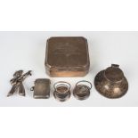 A small group of silver items, including a canted corner square cigarette box, Birmingham 1919 by