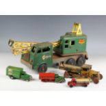 A collection of tinplate and mechanical toys, including a Tri-ang Minic No. 79m delivery van, a