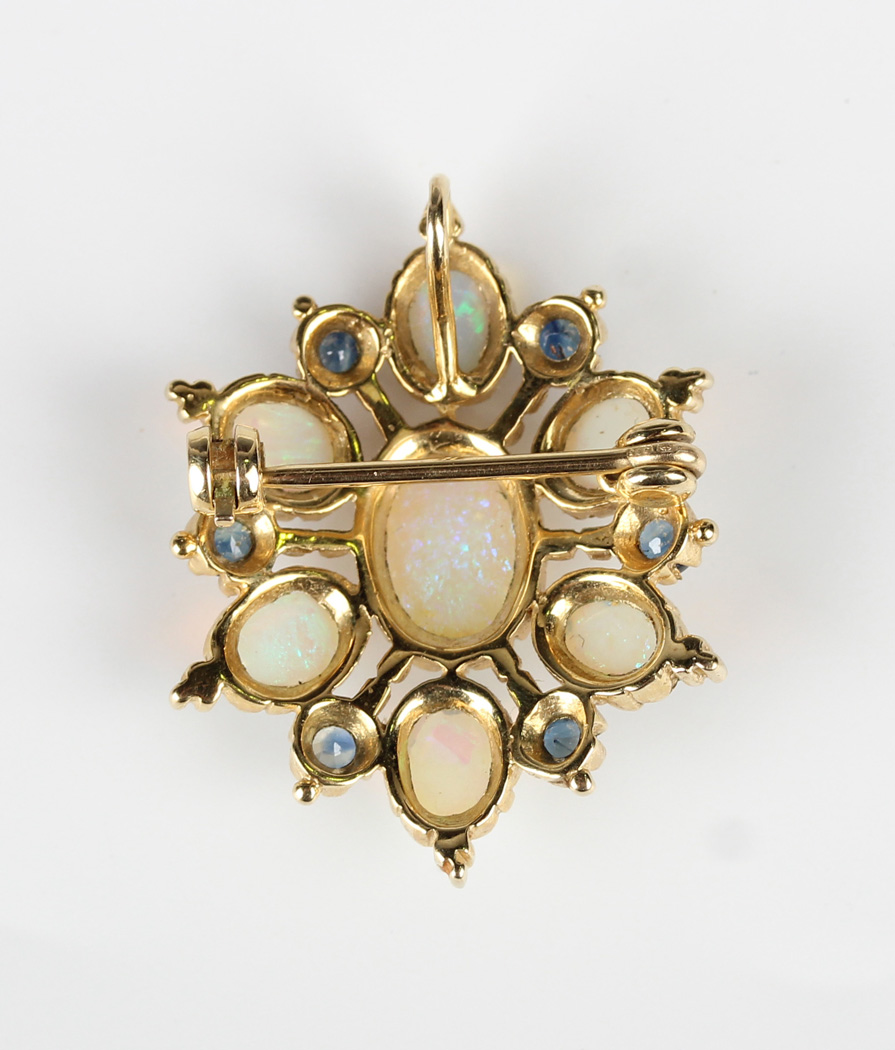 A 9ct gold, opal and sapphire pendant brooch, mounted with the principal oval opal within a surround - Image 2 of 2