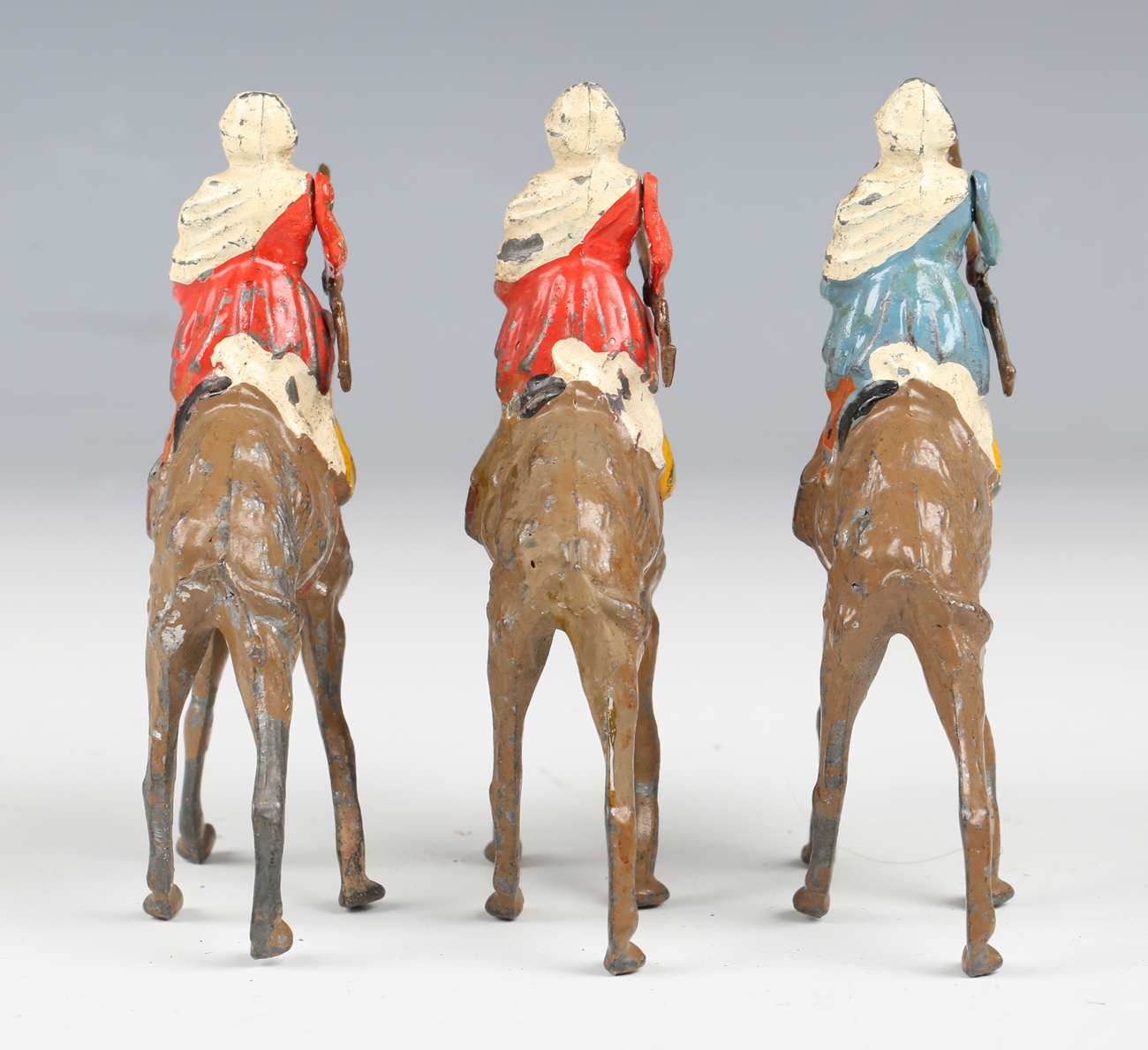 A set of three Britains Arabs of the Desert lead figures, each holding a jezail rifle and riding - Image 2 of 8