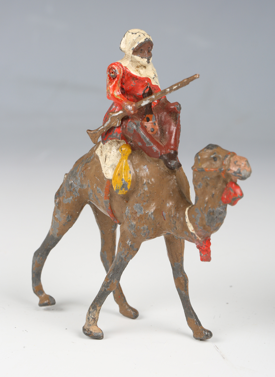 A set of three Britains Arabs of the Desert lead figures, each holding a jezail rifle and riding - Image 6 of 8