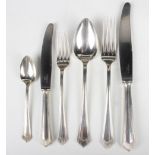 An Art Deco Austrian canteen of .800 silver cutlery with tapering reeded handles, comprising