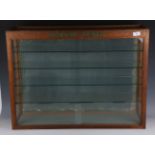 A Hornby Dublo oak and glazed shop display cabinet, fitted with four shelves and sliding doors,