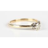 A 9ct gold and diamond single stone ring, claw set with a circular cut diamond, London 1995,