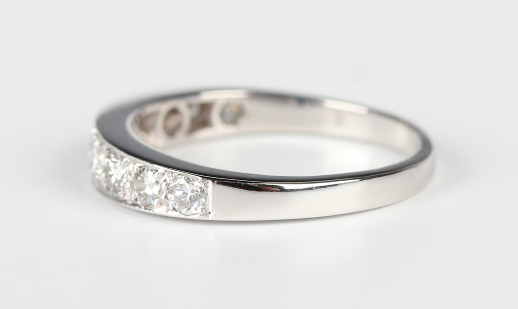 A white gold and diamond nine stone half-hoop eternity ring, mounted with a graduated row of - Image 4 of 5