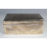 A George V silver rectangular cigarette box, the hinged lid monogram engraved, London 1911, maker'