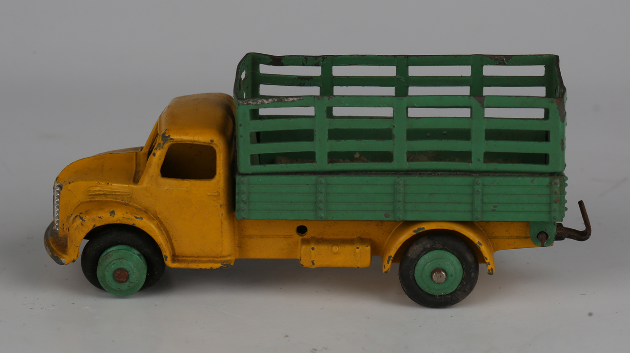 Seven Dinky Toys, comprising No. 420 forward control lorry, red with green wheels, No. 253 Daimler - Image 3 of 8