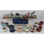 A collection of diecast vehicles, including a Dinky Toys No. 442 Land Rover breakdown crane, a No.