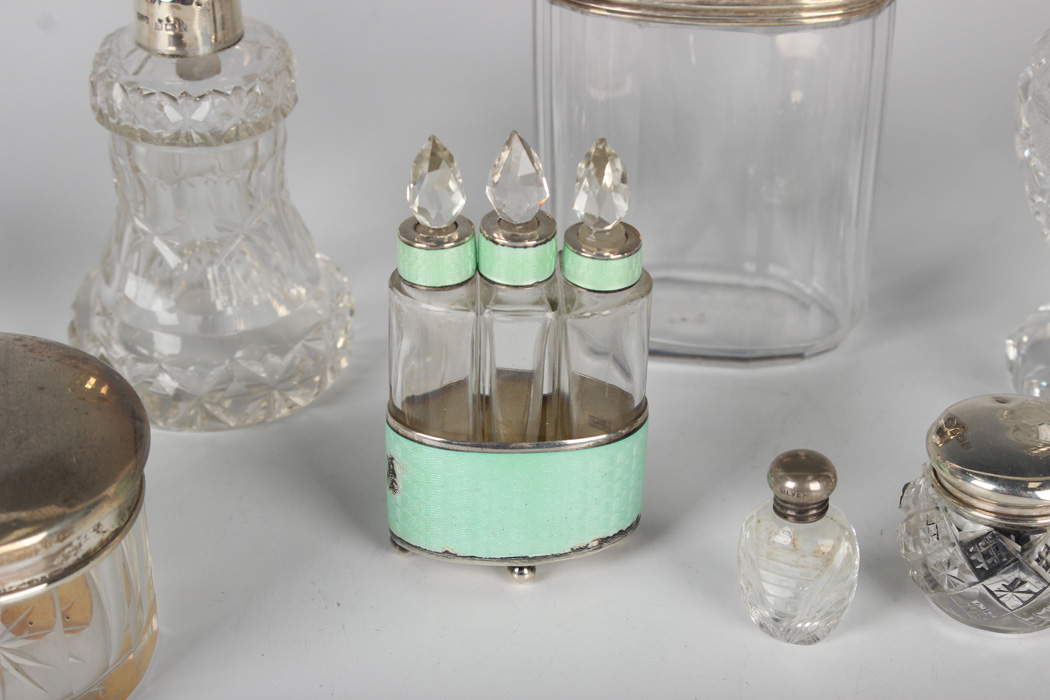 A group of cut glass dressing table bottles and jars with silver lids and collars, a .935 silver and - Image 11 of 11