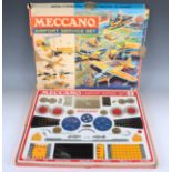 A collection of Meccano, including a Super Junior No. 2 set, a No. 4 Airport Service set, a No. 8